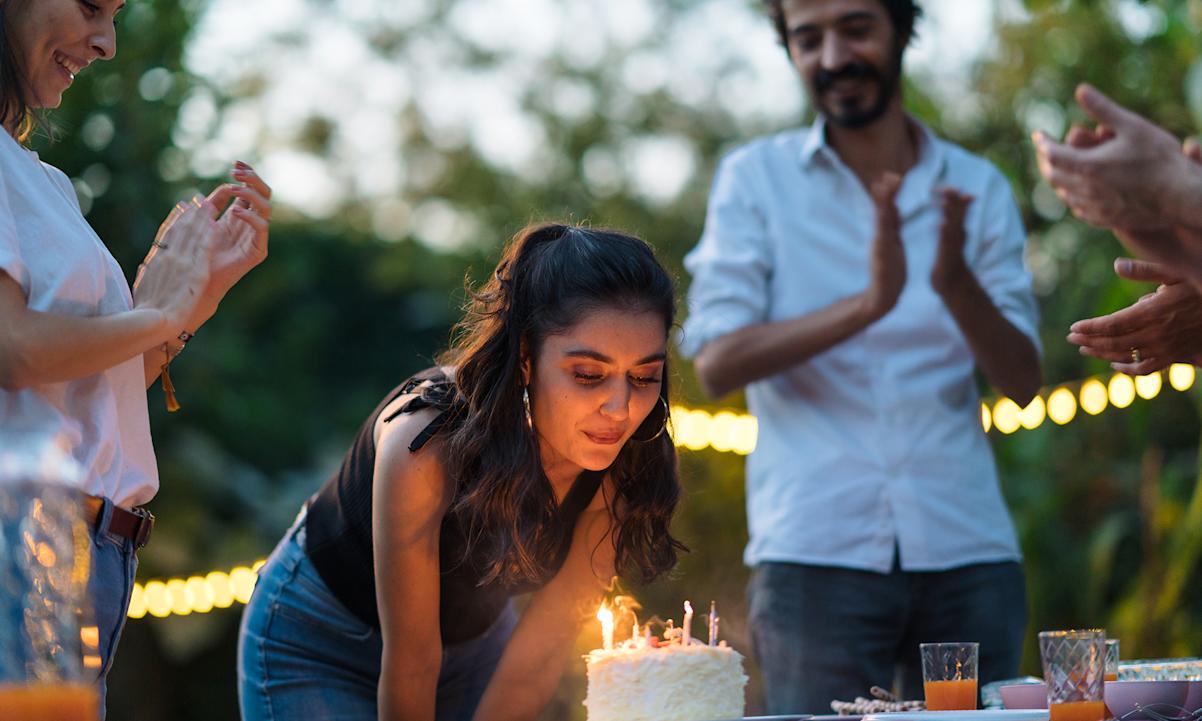 Woman celebrating her birthday with friends