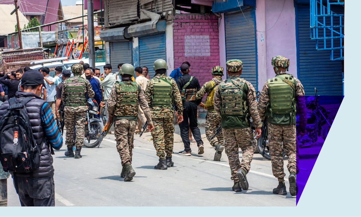 Indian paramilitary soldiers patrol the area after a plane crash on May 7, 2025 in Wuyan, south of Srinagar, India. 