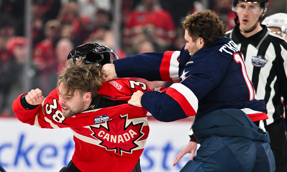 Matthew Tkachuk #19 of Team USA and Brandon Hagel #38 of Team Canada fight