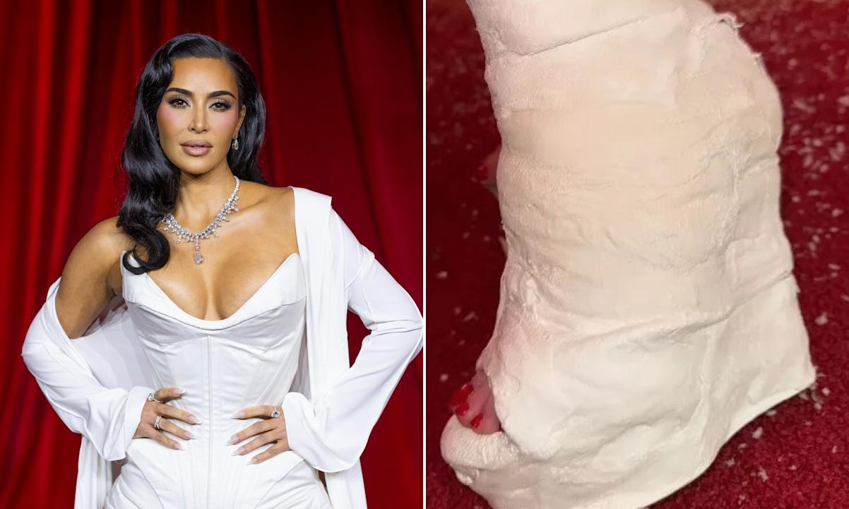  Kim Kardashian and her paper mache-like, wedge heel-shaped foot cast.